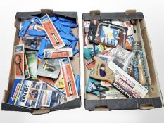 A quantity of tools, mostly in retail packaging, including handsaws, stanley knives, screwdrivers,