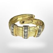 An 18ct gold diamond-set ring, size O. CONDITION REPORT: 6.