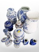 A group of Delft blue and white figurines and bulbous vase,