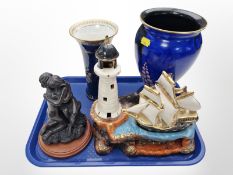 A Carlton Ware lustre trumpet vase, a further Carlton Ware vase on blue ground,