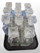 A set of 12 crystal decanters.