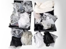 A quantity of clothing in retail condition.