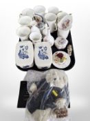 A group of Ringtons porcelain mugs, pair of butter dishes, Wedgwood vases, Ringtons teddy bear, etc.