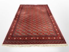 A machine-made carpet of Afghan design,