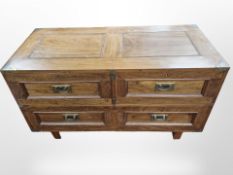 An Eastern hardwood brass inlaid four drawer chest,