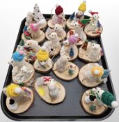 18 anthropomorphic taxidermy mice specimens on Christmas-themed rustic wooden stands, height 10cm.