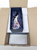 Eight matching Old Tupton Ware figures of a lady in floral dress, height 25cm, all boxed.