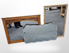 An Art Nouveau walnut mirror, an Art Deco frameless mirror, and a further gilt mirror,