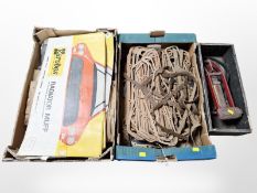 A foot pump and a quantity of car components.