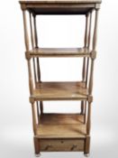 A Victorian rosewood four tier what-not fitted a drawer,
