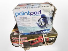 A boxed 3 ton hydraulic floor jack, paint pod roller system, enamelled tool box,