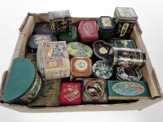 A collection of vintage tins, Ringtons biscuit barrel, blue and white ceramics,
