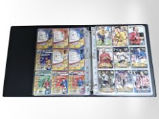 An album of football trading cards bearing facsimile signatures.