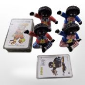 Two sets of German playing cards and four Shudehill Golly figures.