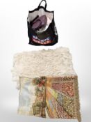An embroidered throw, animal skin rug, bag containing lady's leather handbag, clothing etc.
