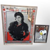 A Michael Jackson picture mirror and a Snoopy mirror, largest 64cm x 46cm.