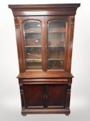 A Victorian style double door bookcase,