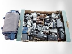 A quantity of vintage cameras, Canon, Konica, Olympus,