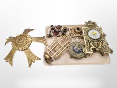 An ornate brass easel desk clock with enamelled dial,