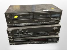 A Technics three-piece Hi-Fi system comprising stereo double cassette deck RS-T130,