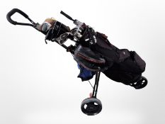 A Skymax golf bag on trolley containing a full set of clubs including Ping G2 460CC driver,
