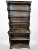 An Ercol stained elm bookcase,