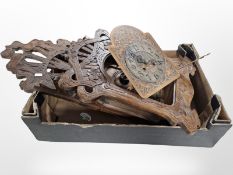 A carved oak wall clock with Gustav Becker twin barrel movement, striking on a gong with pendulum.