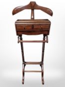A reproduction mahogany valet stand