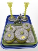 A pair of Art Nouveau pewter-mounted green glass candlesticks and matching dressing table tray,