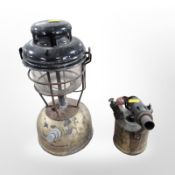 A vintage Tilley oil lamp and a Monitor blow torch.