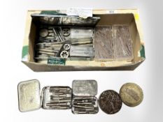 A quantity of various metal taps and dies,