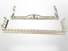 Two Victorian brass fire curbs, largest 148cm wide.