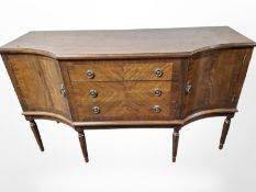 A reproduction mahogany inverted bow front sideboard,