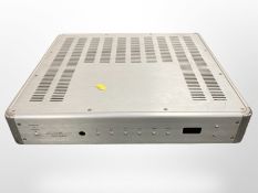 A Krell KAV-300iL amplifier, with power lead and remote.