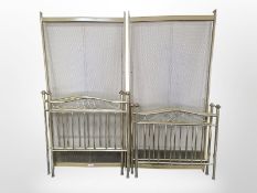 A pair of contemporary brass 3' bed frames