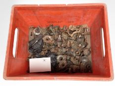 A quantity of brass door handle collars.