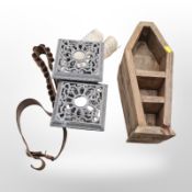 A leather bandolier, pair of contemporary cast-metal lanterns, rolled sheet music,