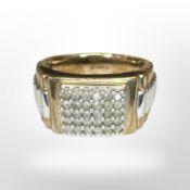 A 9ct gold 'Rolex' style diamond-set signet ring, the stated total diamond weight 0.