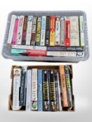 A collection of volumes, all signed by respective authors.