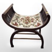 An early 20th century X-frame stool