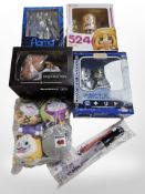 A group of figurines including Dragon Age: Inquisition, Umaru, Sword Art Online, etc., boxed.