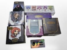 A group of Riot Games League of Legends figurines and related collectibles, all boxed.
