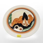 A Clarice Cliff for Newport Pottery Bizarre hand-painted circular plate, diameter 25.5cm.