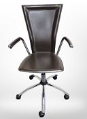 A stitched vinyl computer swivel chair