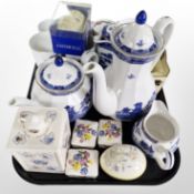 A group of Ringtons blue and white tea china, mugs, trinket boxes, die-cast horse and cart, etc.