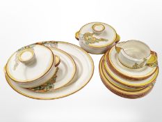 21 pieces of Clarice Cliff for Wilkinson Ltd Bizarre dinner wares in the Sunshine pattern.