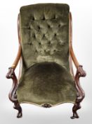 A Victorian carved mahogany salon armchair