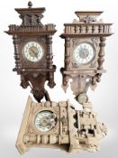 Two continental carved oak eight day wall clocks and a similar wall clock (3)