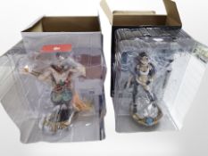 Two boxed Riot Games League of Legends figurines, Akali and Rakan, in original boxes.