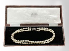 A cultured pearl double-strand necklace with silver and marcasite clasp,
